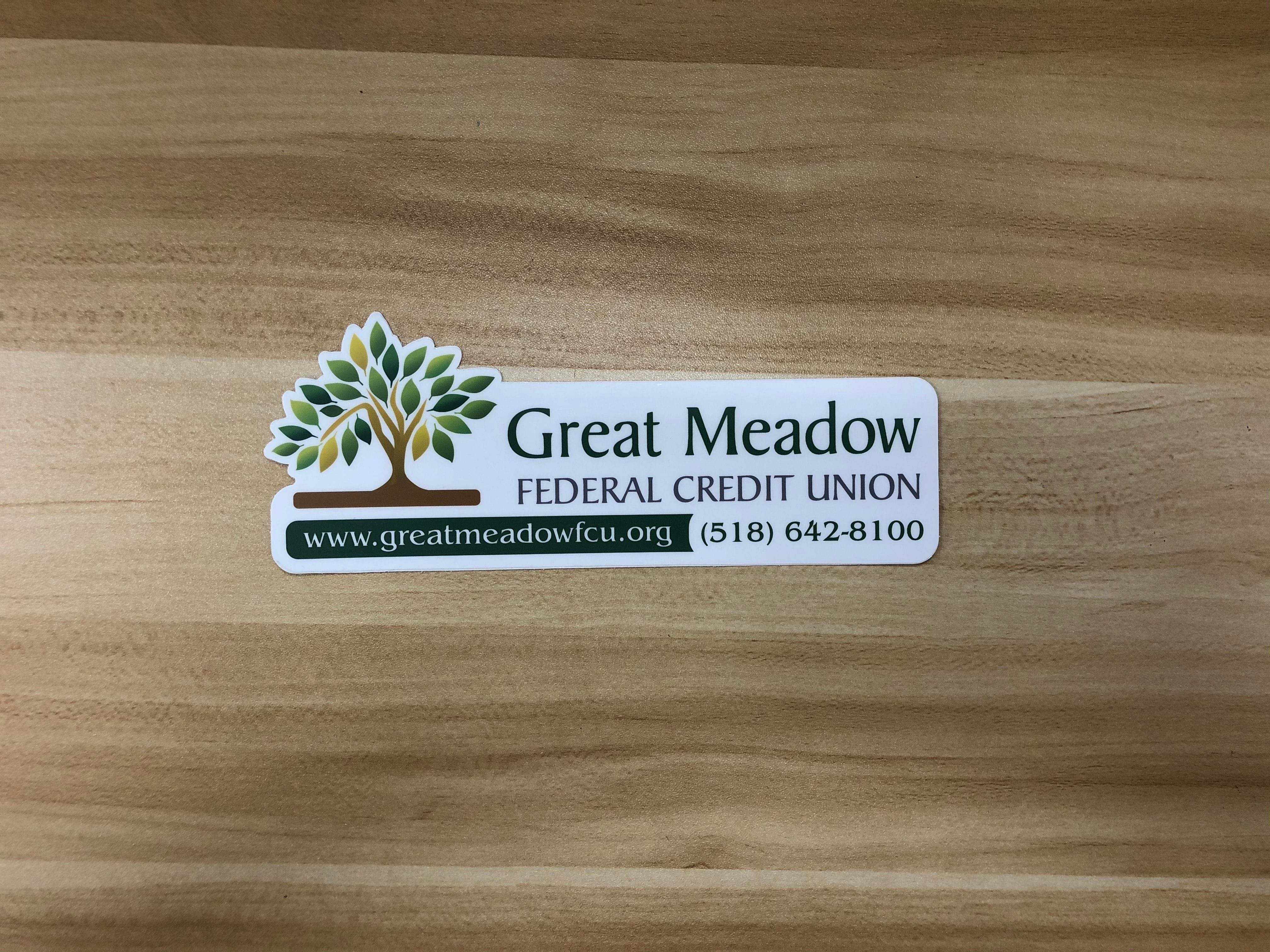 Full color logo sitcker cutout to shape of logo.
